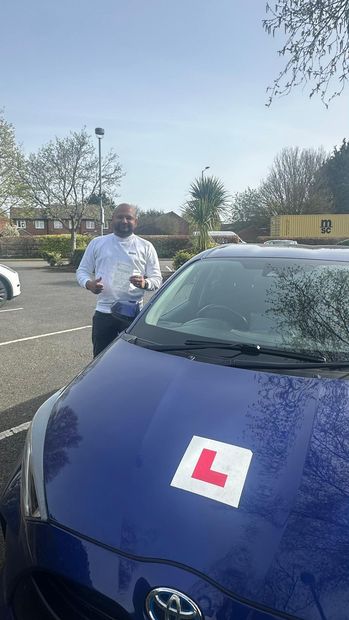 Pass Right Driving School pupil with their driving test pass certificate