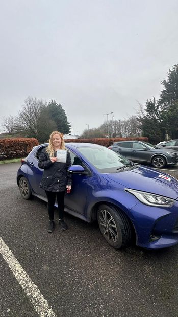 Pass Right Driving School pupil with their driving test pass certificate
