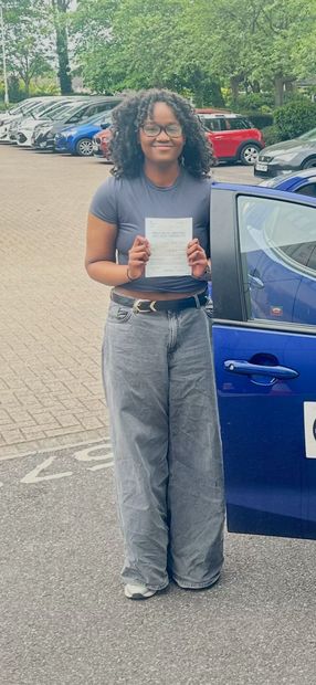 Pass Right Driving School pupil with their driving test pass certificate